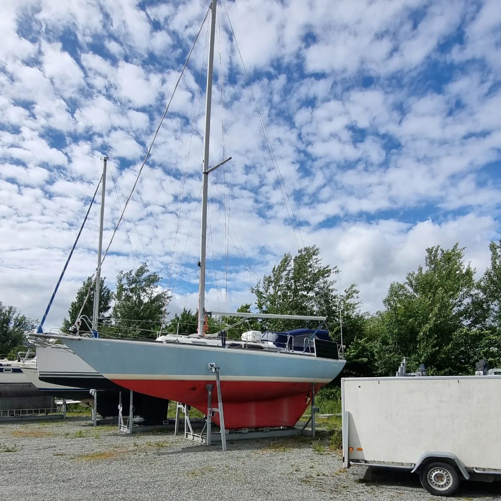Fortissimo 33 on the dry dock showing red hull paint